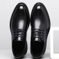 Elevator shoes with built-in height increase insoles, stylish black leather dress shoes designed to add extra height discreetly. Suitable for formal occasions and professional settings.